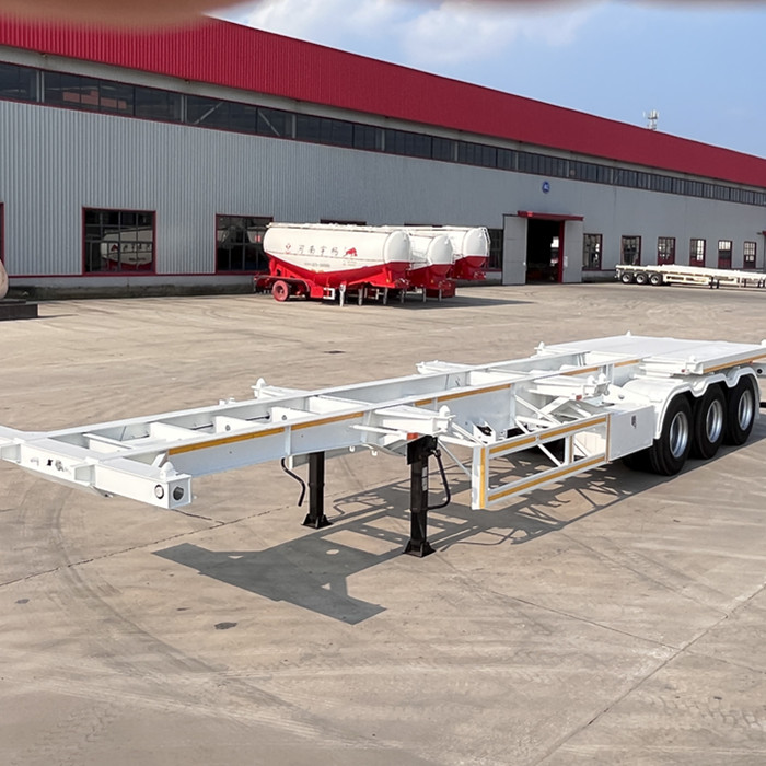 How to lift and load containers on a trailer
