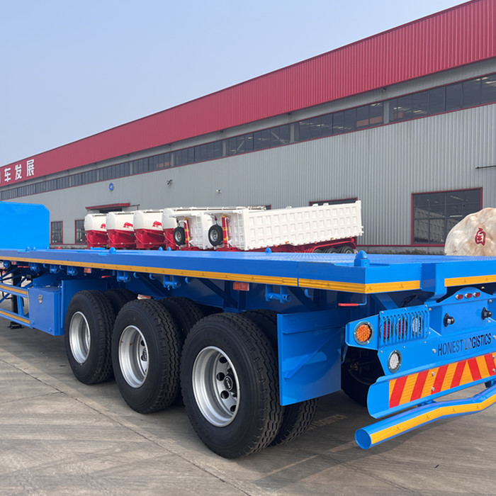 How to strap down a load on a flatbed trailer