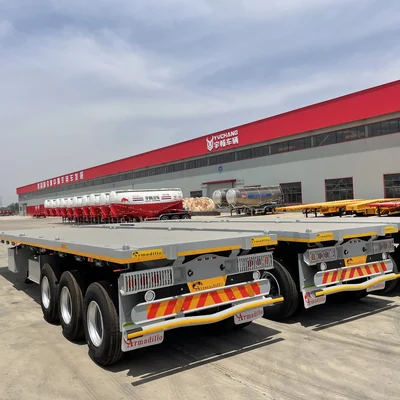 Finished semi trailers in factory yard ready for final review before shipment